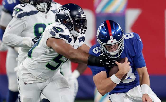 New York Giants quarterback Daniel Jones (8) is tackled by Seattle Seahawks linebacker Bobby Wagner (54) during the fourth quarter at MetLife Stadium.